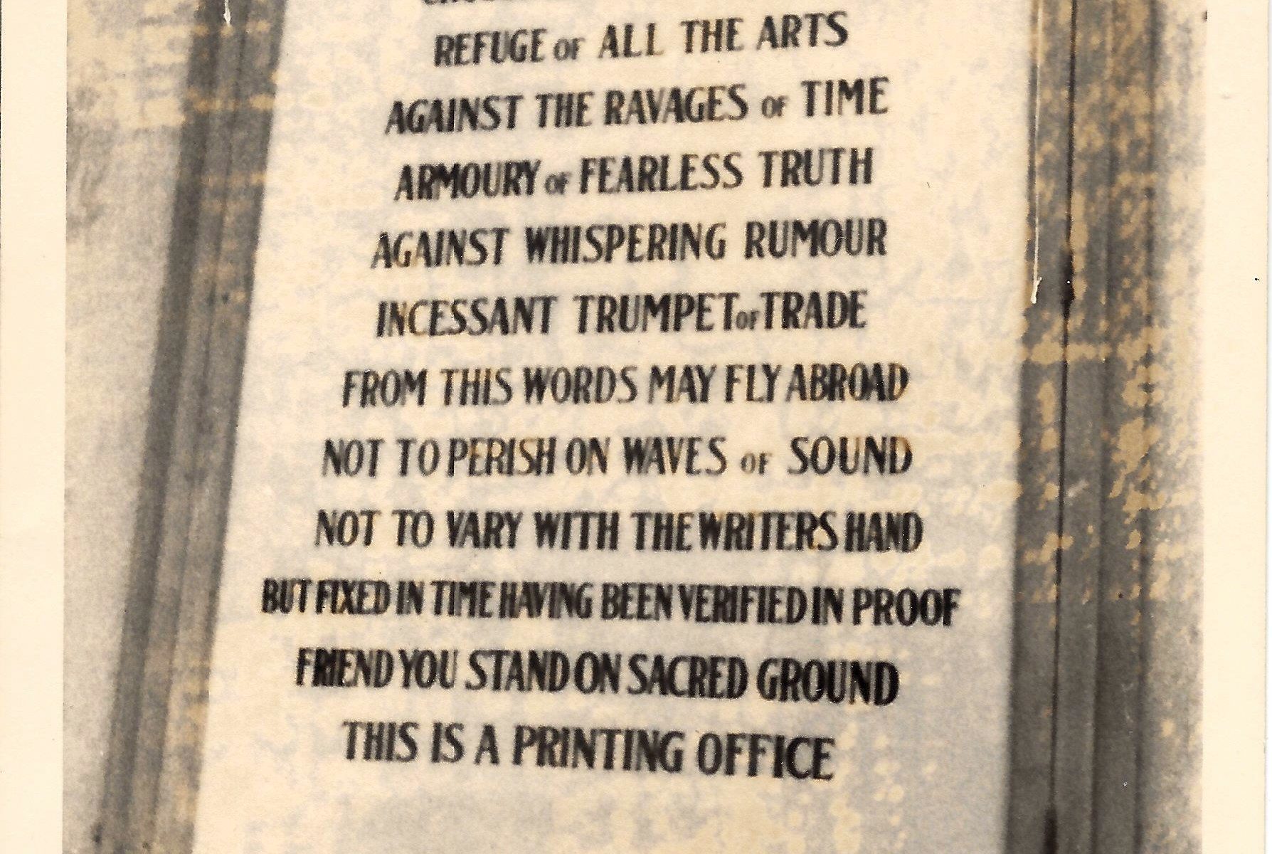 A sign that is on the side of a building.